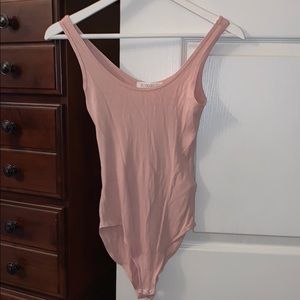 Pink bodysuit